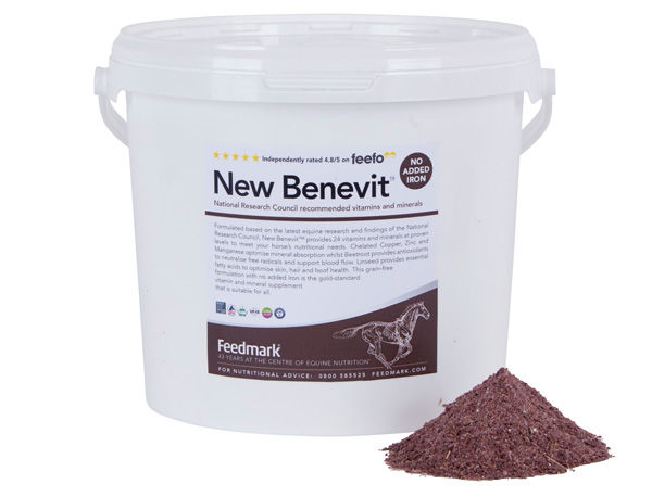 New benevit tub on white background with pile of product